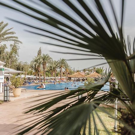 เคนซี เมนารา พาเลซ ออล อินคลูซีฟ พรีเมียม Hotel มาร์ราเกช ภายนอก รูปภาพ A swimming pool in a hotel in Tunisia