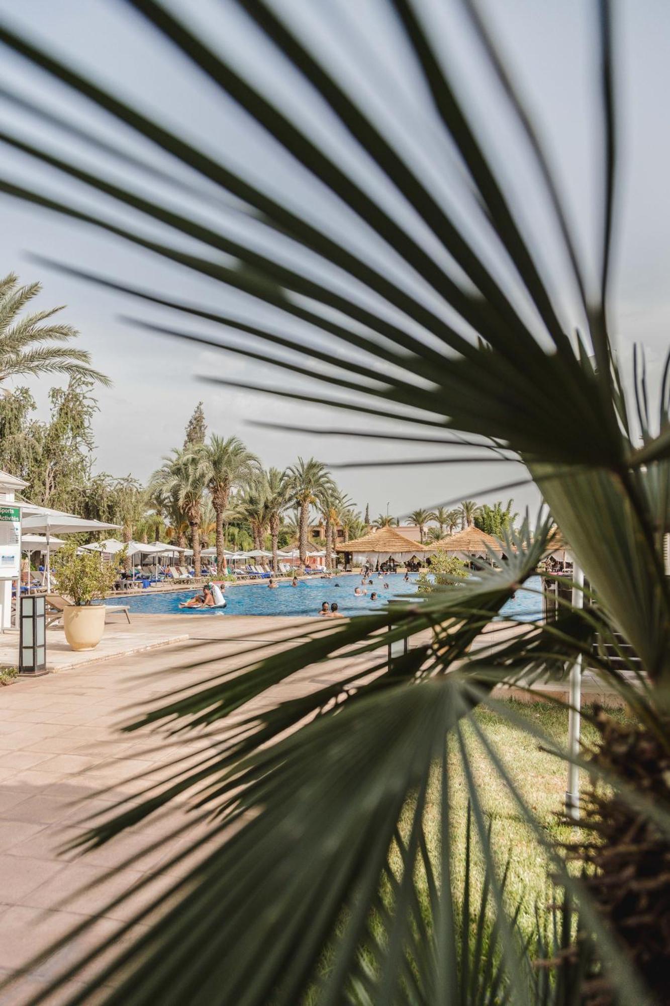 เคนซี เมนารา พาเลซ ออล อินคลูซีฟ พรีเมียม Hotel มาร์ราเกช ภายนอก รูปภาพ A swimming pool in a hotel in Tunisia